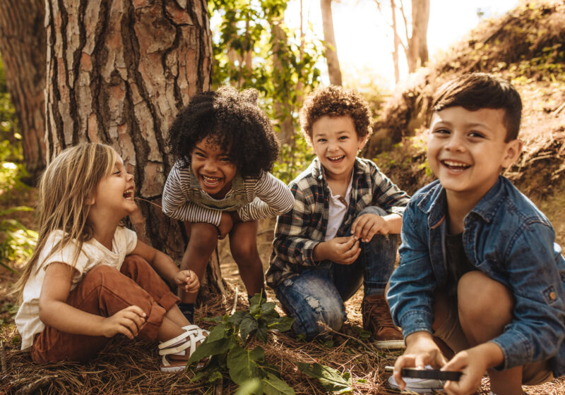 children playing in the woods